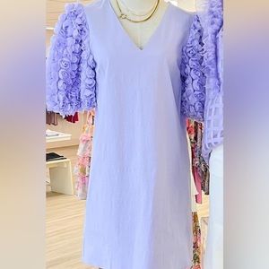 Boutique dress. Never worn. Still has tags.